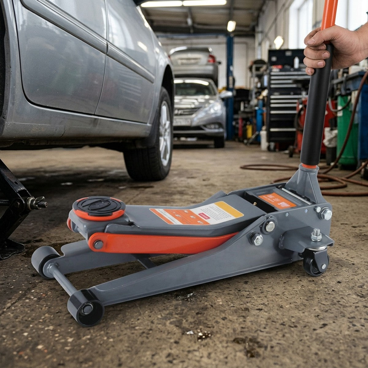 3 Ton Double Pump Low Profile Floor Jack — in use